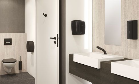 Do public and commercial washrooms need specific hygienic accessories?